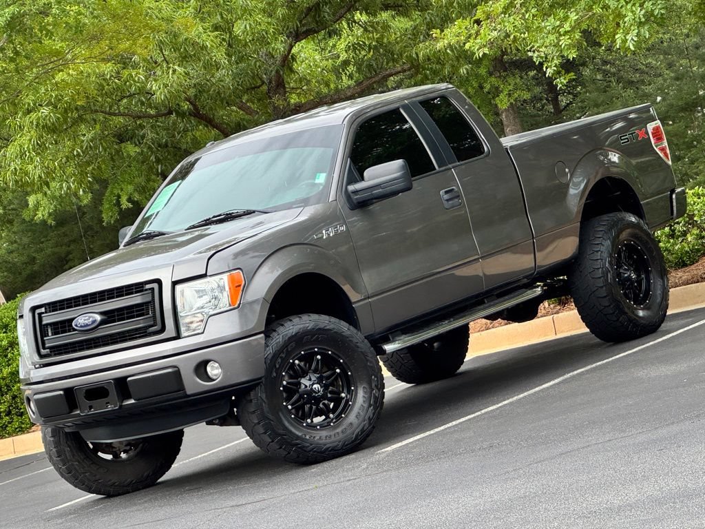 Used 2013 Ford F150 STX w/ Mid Equipment Group RWD image 1