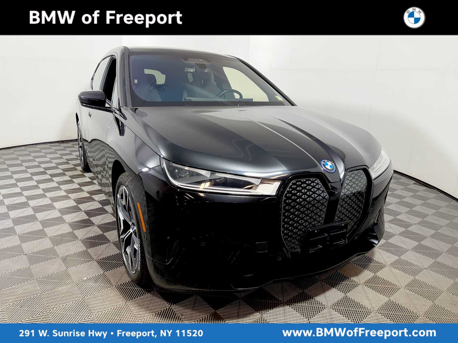 Used 2024 BMW iX xDrive50 w/ Premium Package AWD/4WD image 1