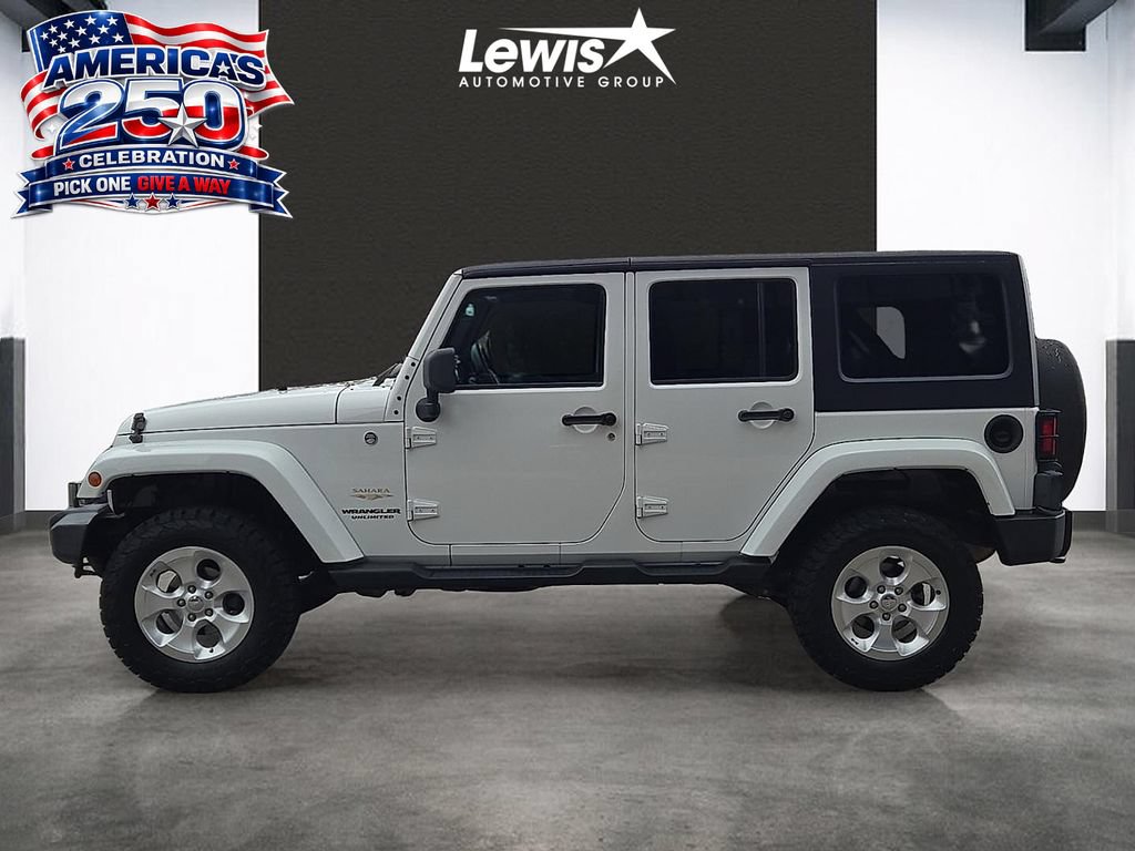 Used 2013 Jeep Wrangler Unlimited Sahara w/ Connectivity Group AWD/4WD image 2