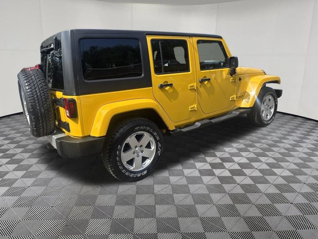 Used 2011 Jeep Wrangler Unlimited Sahara w/ Dual Top Group AWD/4WD image 10