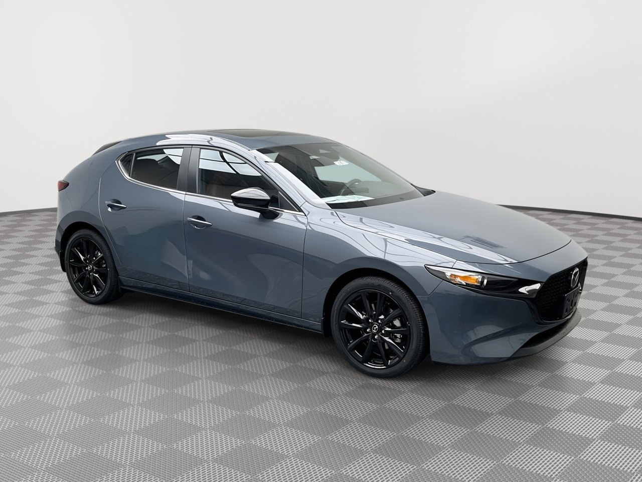New 2026 MAZDA MAZDA3 Carbon AWD/4WD image 1