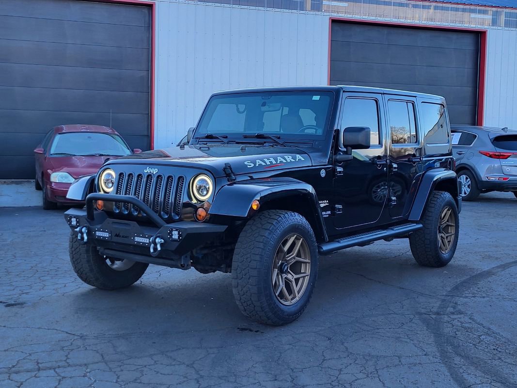 Used 2012 Jeep Wrangler Unlimited Sahara w/ Dual Top Group