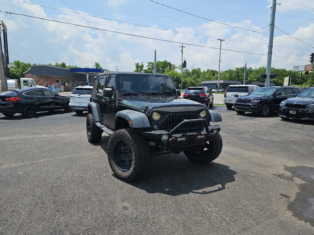 Used 2014 Jeep Wrangler Unlimited Rubicon w/ Connectivity Group AWD/4WD image 1