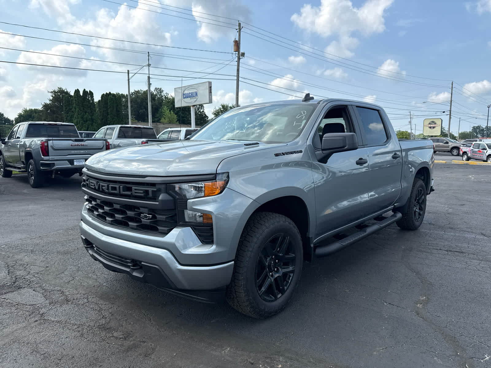 New 2026 Chevrolet Silverado 1500 Custom w/ Turbomax Blackout Package AWD/4WD image 1