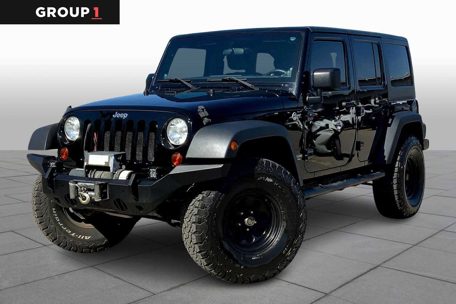 Used 2011 Jeep Wrangler Unlimited Sport