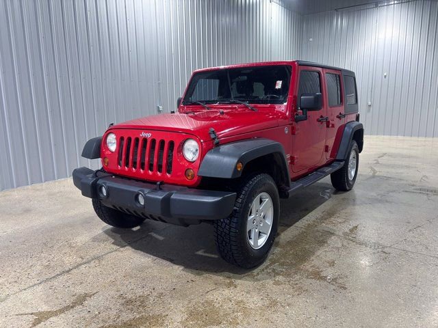Used 2012 Jeep Wrangler Unlimited Sport image 1