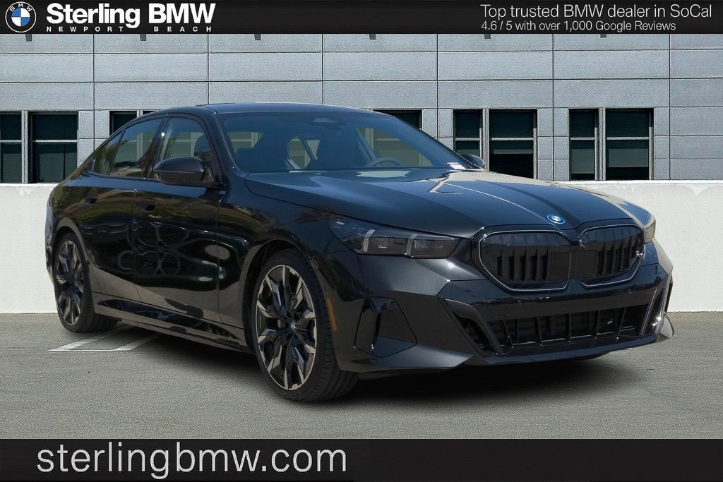New 2026 BMW 550e xDrive w/ Premium Package AWD/4WD image 1
