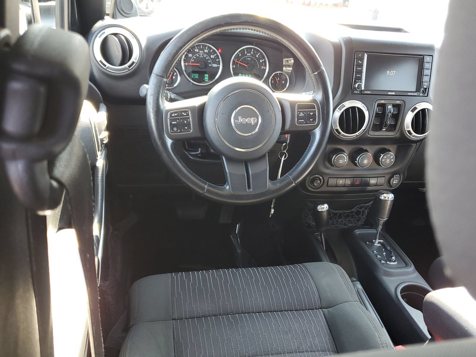 Used 2012 Jeep Wrangler Unlimited Sahara w/ Dual Top Group AWD/4WD image 9