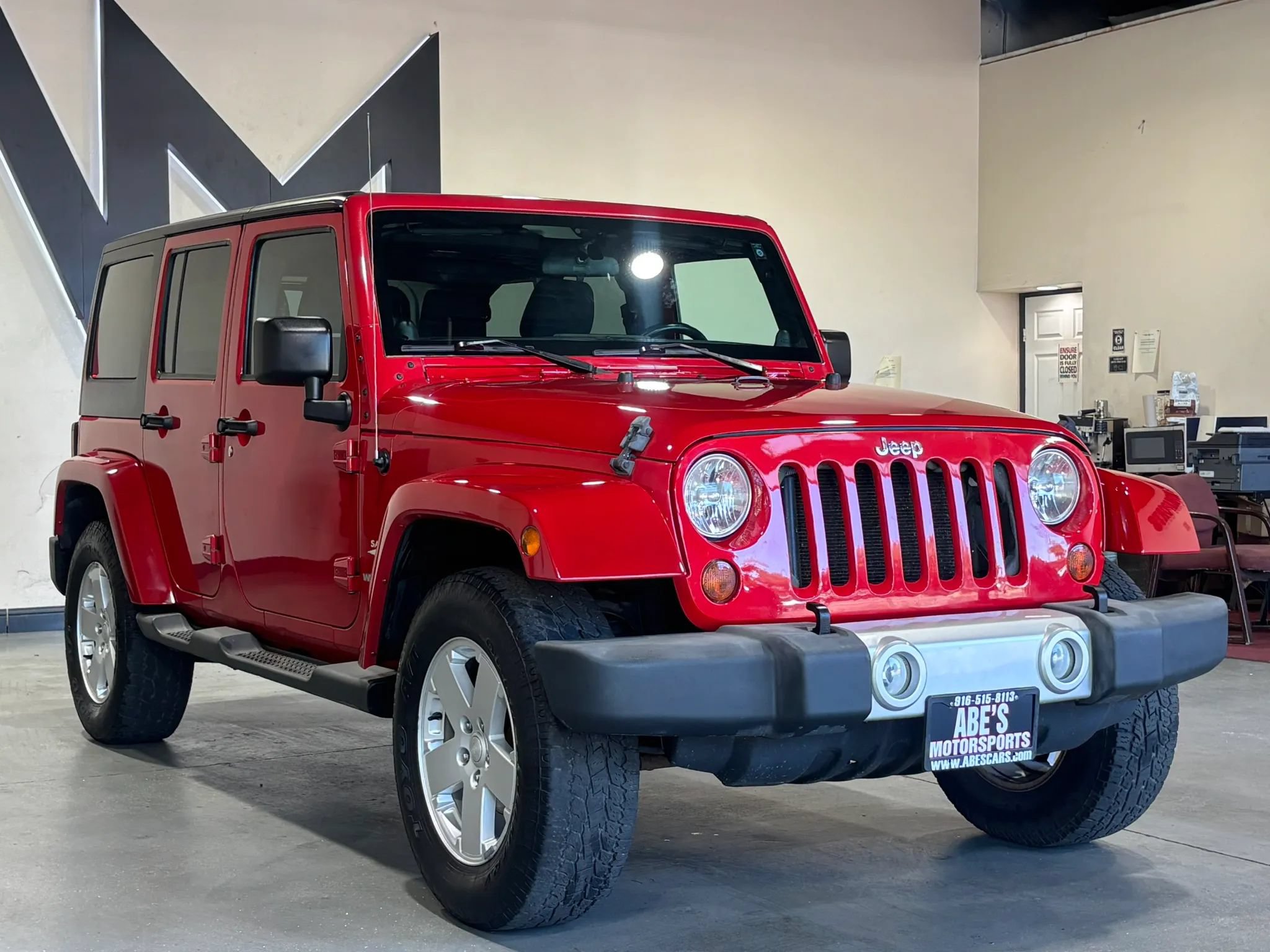 Used 2011 Jeep Wrangler Unlimited Sahara w/ Dual Top Group AWD/4WD image 3