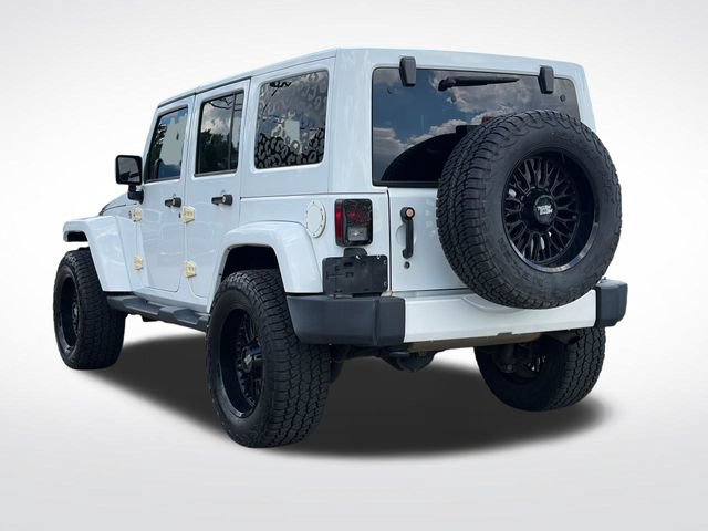 Used 2014 Jeep Wrangler Unlimited Sahara w/ Dual Top Group AWD/4WD image 15
