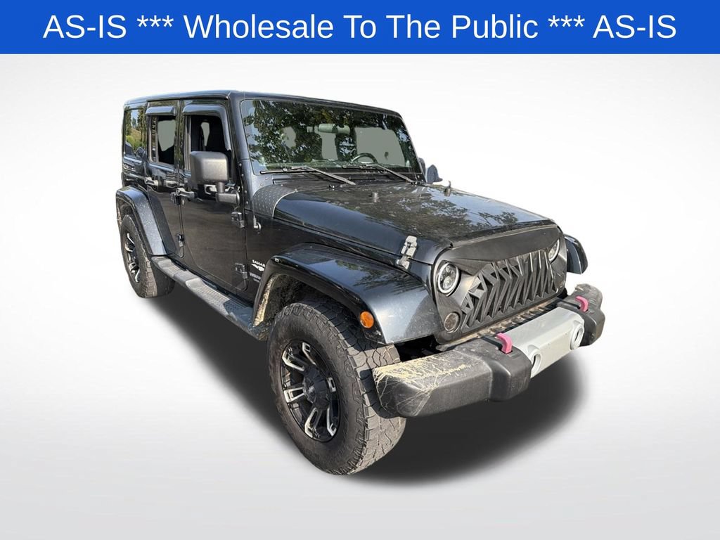 Used 2012 Jeep Wrangler Unlimited Sahara w/ Dual Top Group AWD/4WD image 1