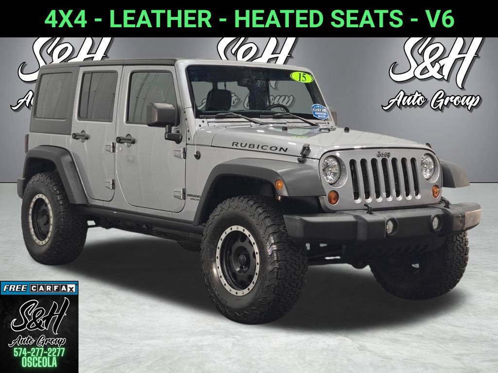 Used 2013 Jeep Wrangler Unlimited Rubicon w/ Dual Top Group AWD/4WD image 1