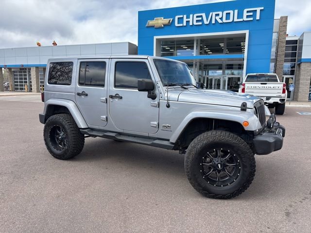 Used 2014 Jeep Wrangler Unlimited Sahara AWD/4WD image 1