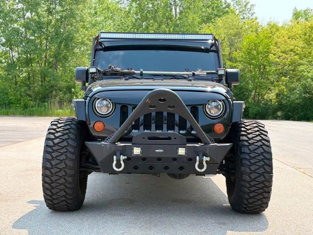 Used 2013 Jeep Wrangler Unlimited Sahara w/ Dual Top Group AWD/4WD image 2