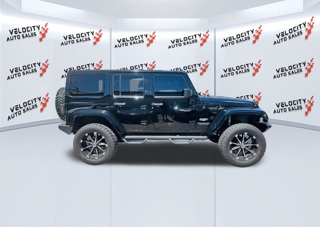 Used 2014 Jeep Wrangler Unlimited Sahara w/ Connectivity Group AWD/4WD image 2