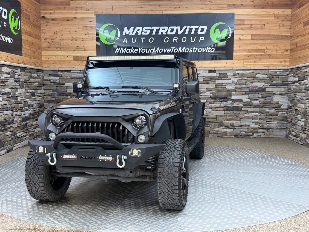 Used 2016 Jeep Wrangler Unlimited Sport w/ Connectivity Group AWD/4WD video 3