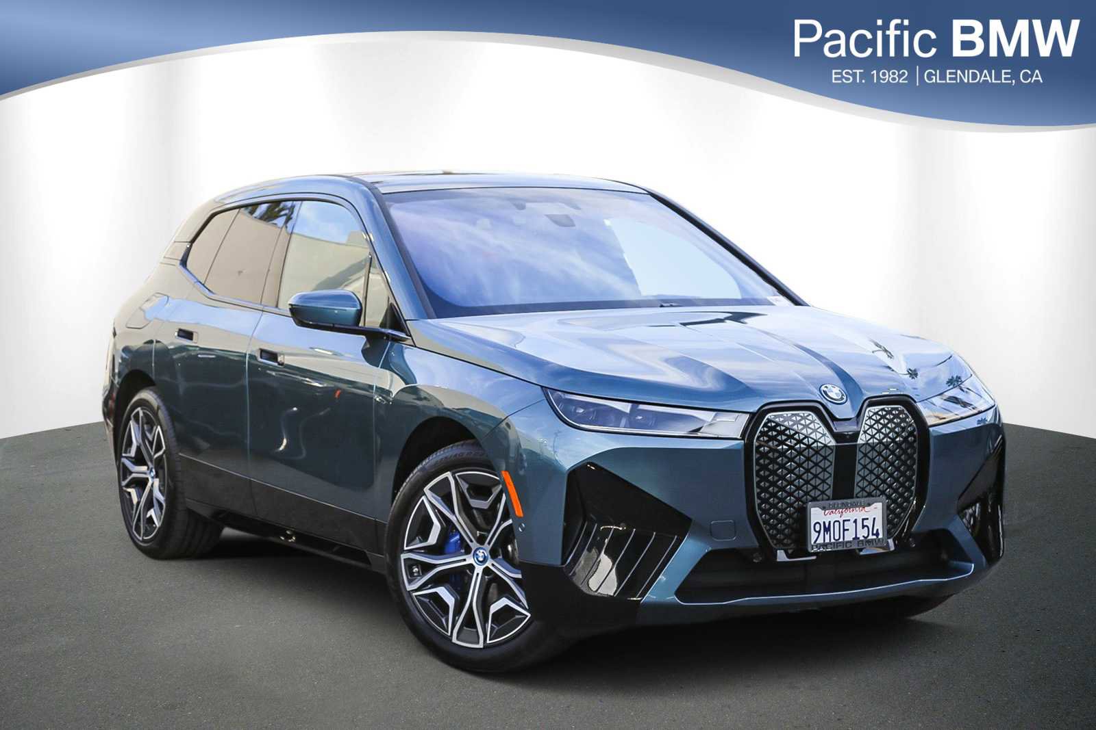 Used 2025 BMW iX xDrive50 w/ Premium Package image 1