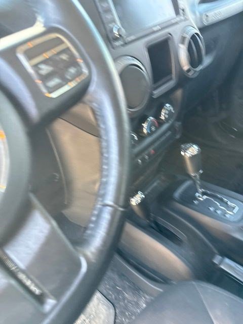 Used 2017 Jeep Wrangler Unlimited Sport w/ Mopar Black Appearance Group AWD/4WD image 11