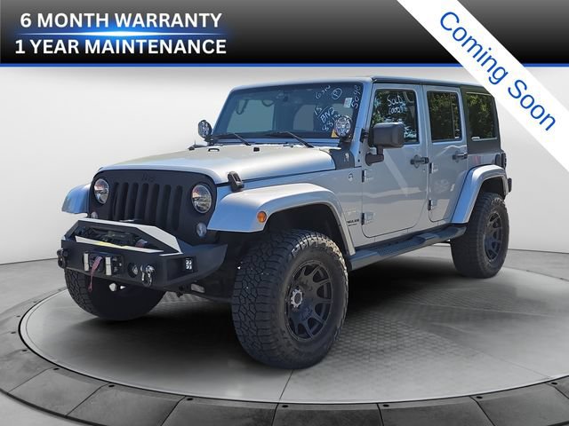 Used 2015 Jeep Wrangler Unlimited Sahara w/ Dual Top Group AWD/4WD video 1