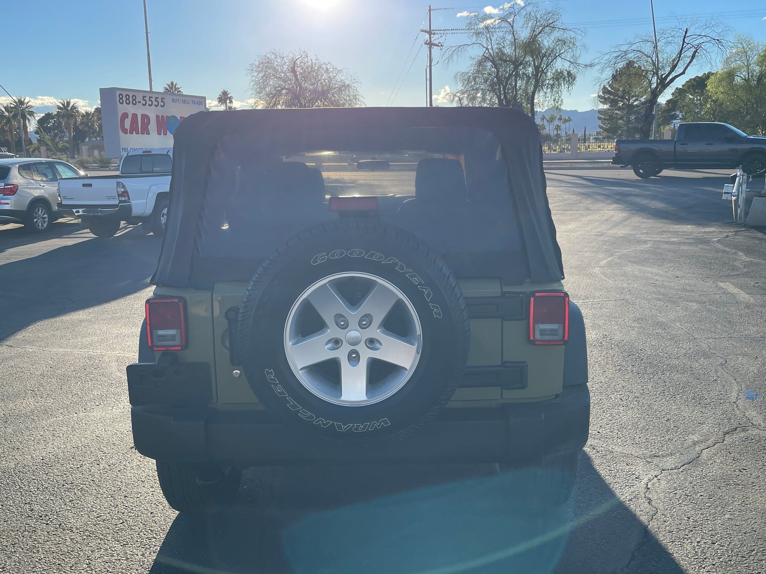 Used 2013 Jeep Wrangler Unlimited Sport w/ Mopar Black Appearance Group AWD/4WD image 4