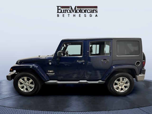 Used 2013 Jeep Wrangler Unlimited Sahara w/ Dual Top Group AWD/4WD image 2