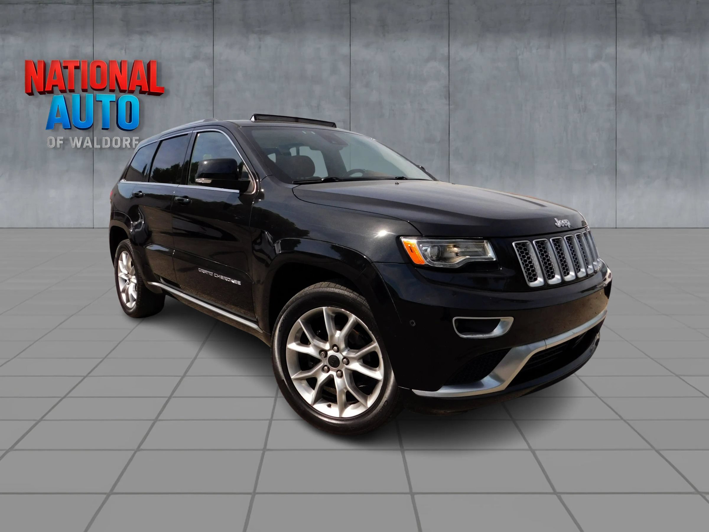 Used 2015 Jeep Grand Cherokee Summit w/ Platinum Series Group AWD/4WD image 1