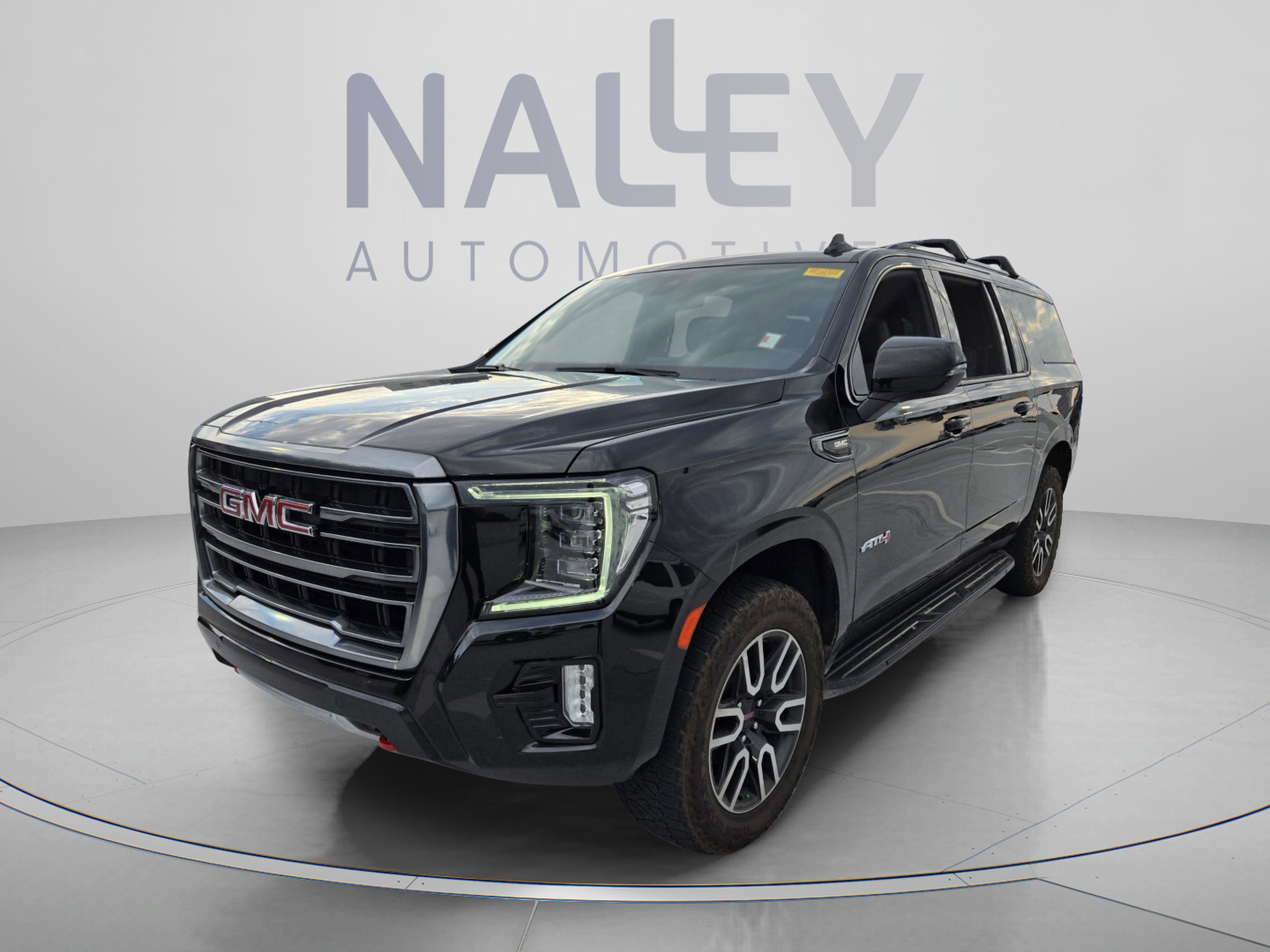 Used 2021 GMC Yukon XL AT4 w/ Rear Media and Nav Package AWD/4WD image 1