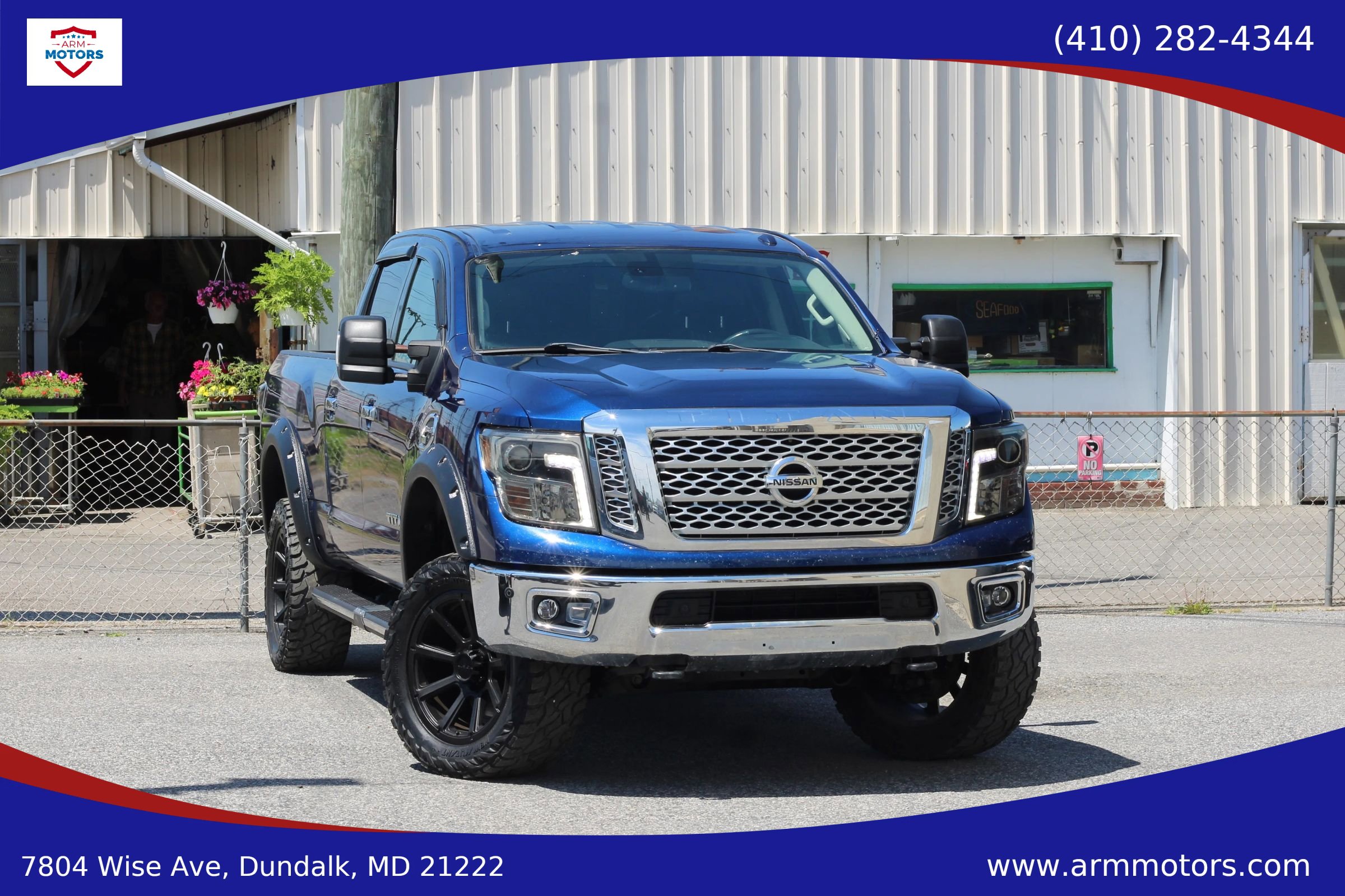 Used 2016 Nissan Titan SL AWD/4WD image 1