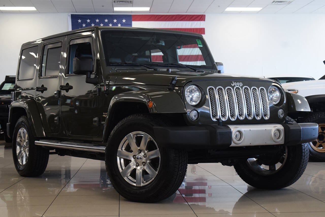 Used 2015 Jeep Wrangler Unlimited Sahara w/ Dual Top Group AWD/4WD image 1