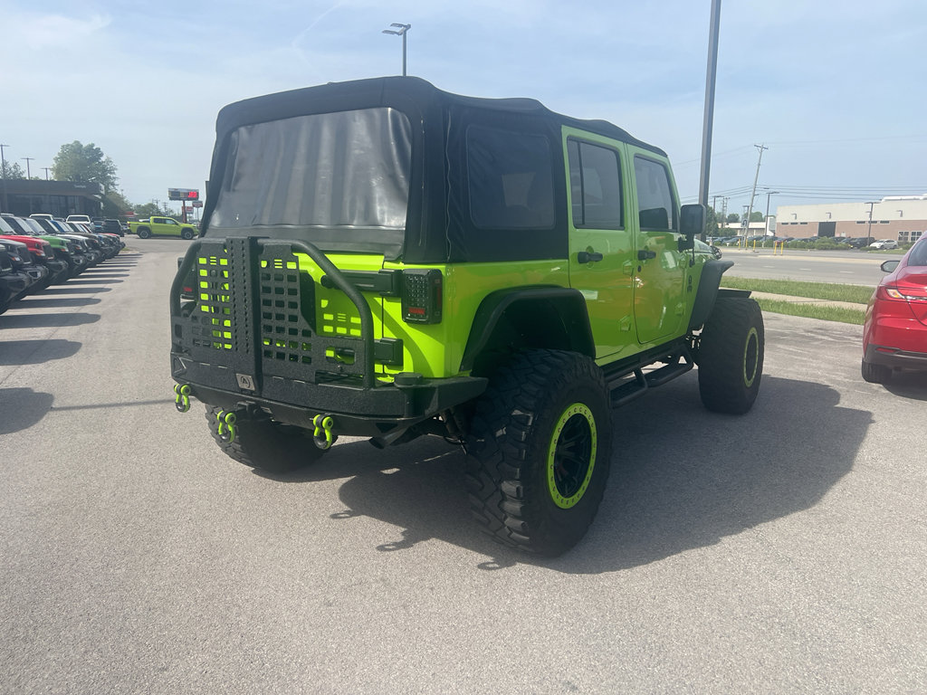 Used 2012 Jeep Wrangler Unlimited Rubicon w/ Dual Top Group AWD/4WD image 6