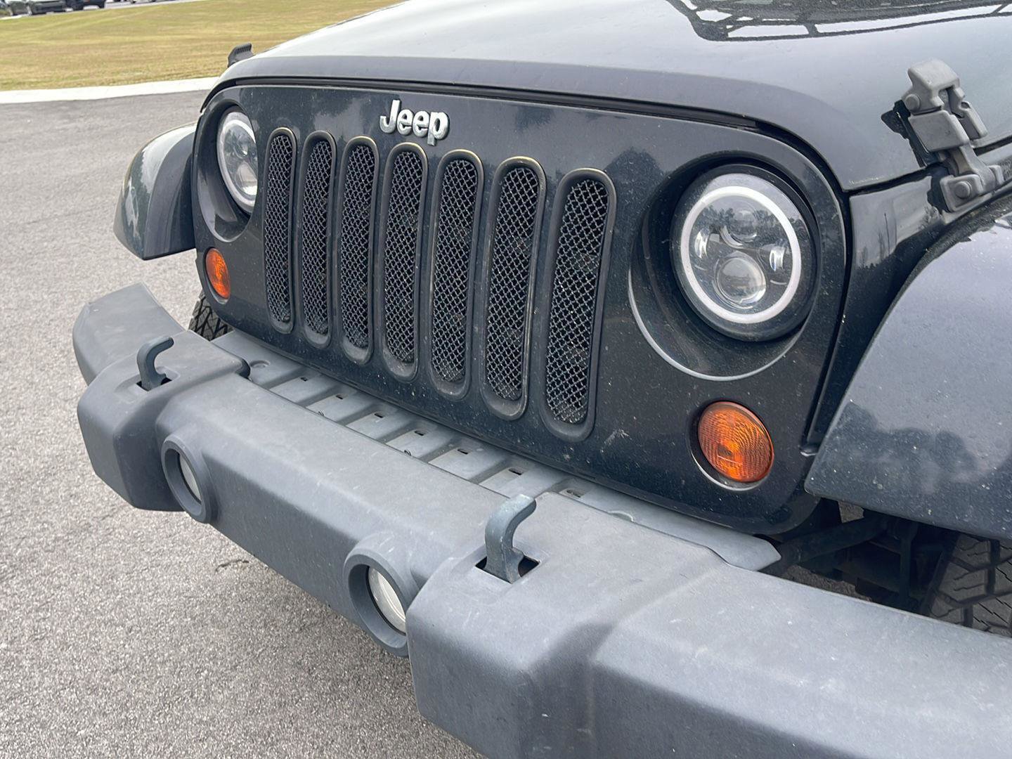 Used 2013 Jeep Wrangler Unlimited Sahara w/ Dual Top Group image 11