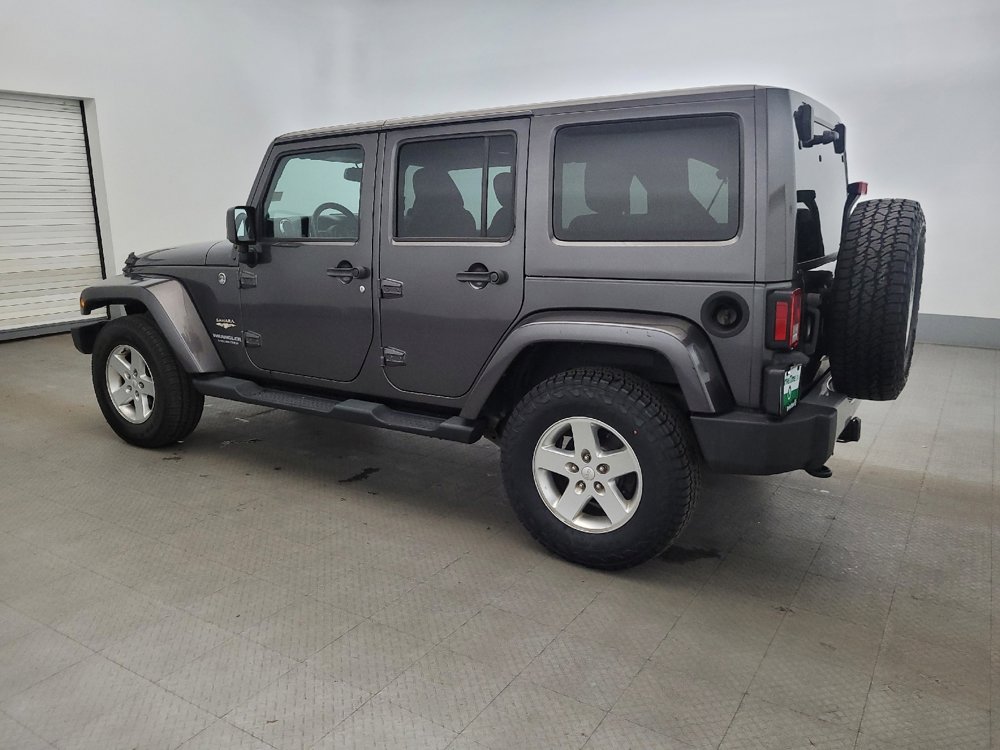 Used 2014 Jeep Wrangler Unlimited Sahara w/ Dual Top Group AWD/4WD image 3