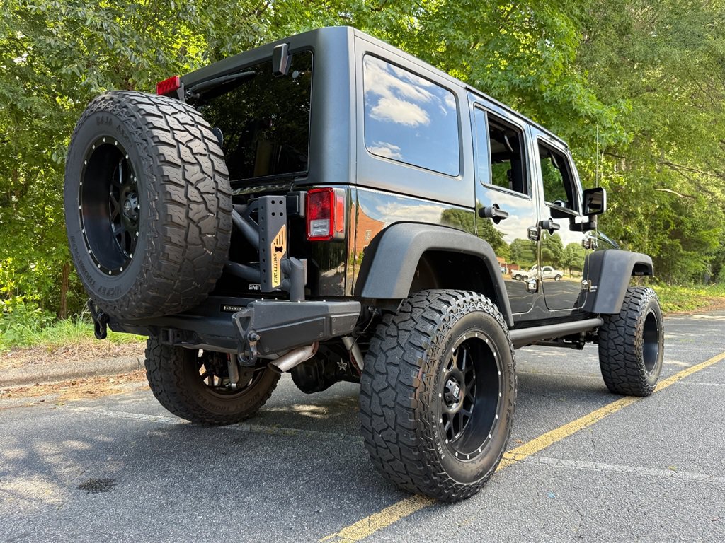 Used 2015 Jeep Wrangler Unlimited Rubicon w/ Dual Top Group AWD/4WD image 31