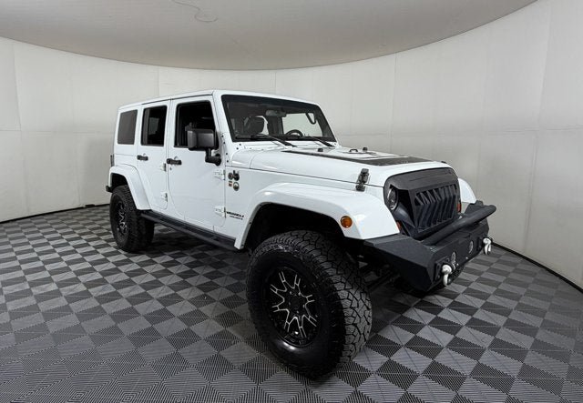 Used 2012 Jeep Wrangler Unlimited Sahara AWD/4WD image 1