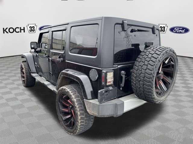 Used 2011 Jeep Wrangler Unlimited Sahara w/ Dual Top Group AWD/4WD image 6