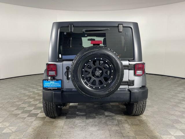Used 2014 Jeep Wrangler Unlimited Sport w/ Mopar Black Appearance Group image 23