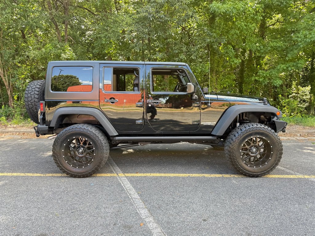 Used 2015 Jeep Wrangler Unlimited Rubicon w/ Dual Top Group AWD/4WD image 26