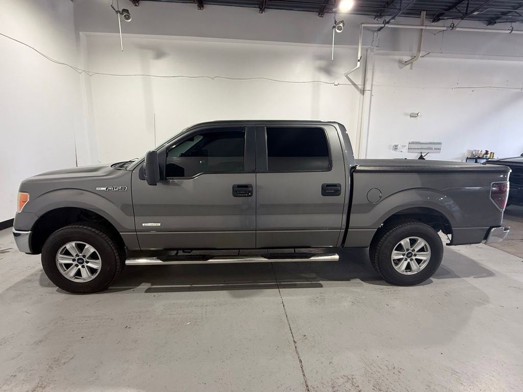 Used 2013 Ford F150 XLT w/ Mid Equipment Group image 1