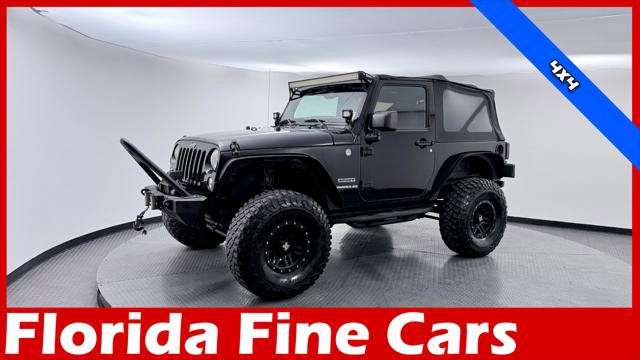 Used 2013 Jeep Wrangler Sport AWD/4WD video 1
