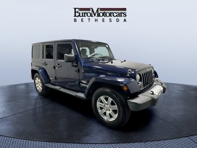 Used 2013 Jeep Wrangler Unlimited Sahara w/ Dual Top Group AWD/4WD image 7