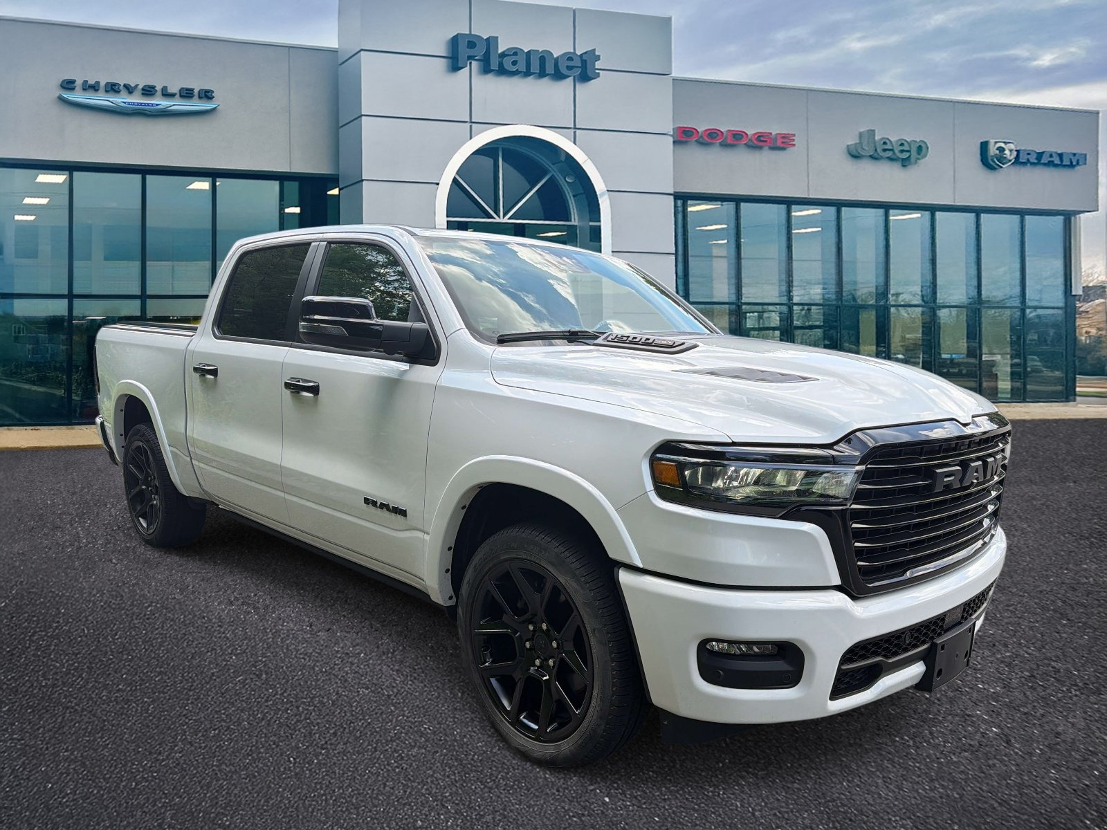 Used 2025 RAM 1500 Laramie w/ Night Edition AWD/4WD image 1