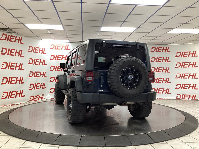 Used 2017 Jeep Wrangler Unlimited Sport w/ Mopar Black Appearance Group AWD/4WD image 5