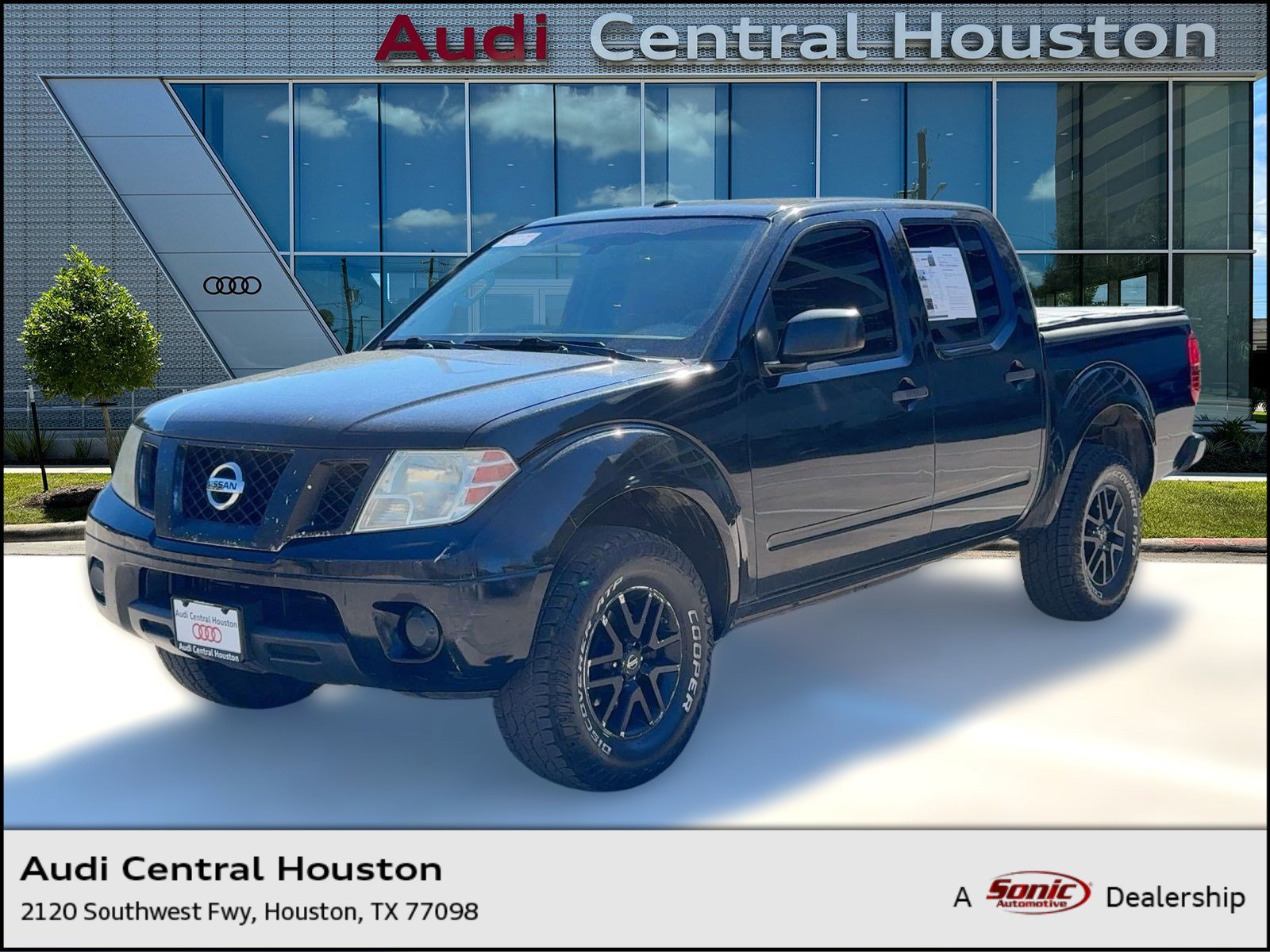 Used 2014 Nissan Frontier SV image 1