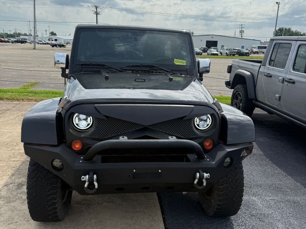 Used 2011 Jeep Wrangler Unlimited 70th Anniversary w/ Dual Top Group AWD/4WD image 14