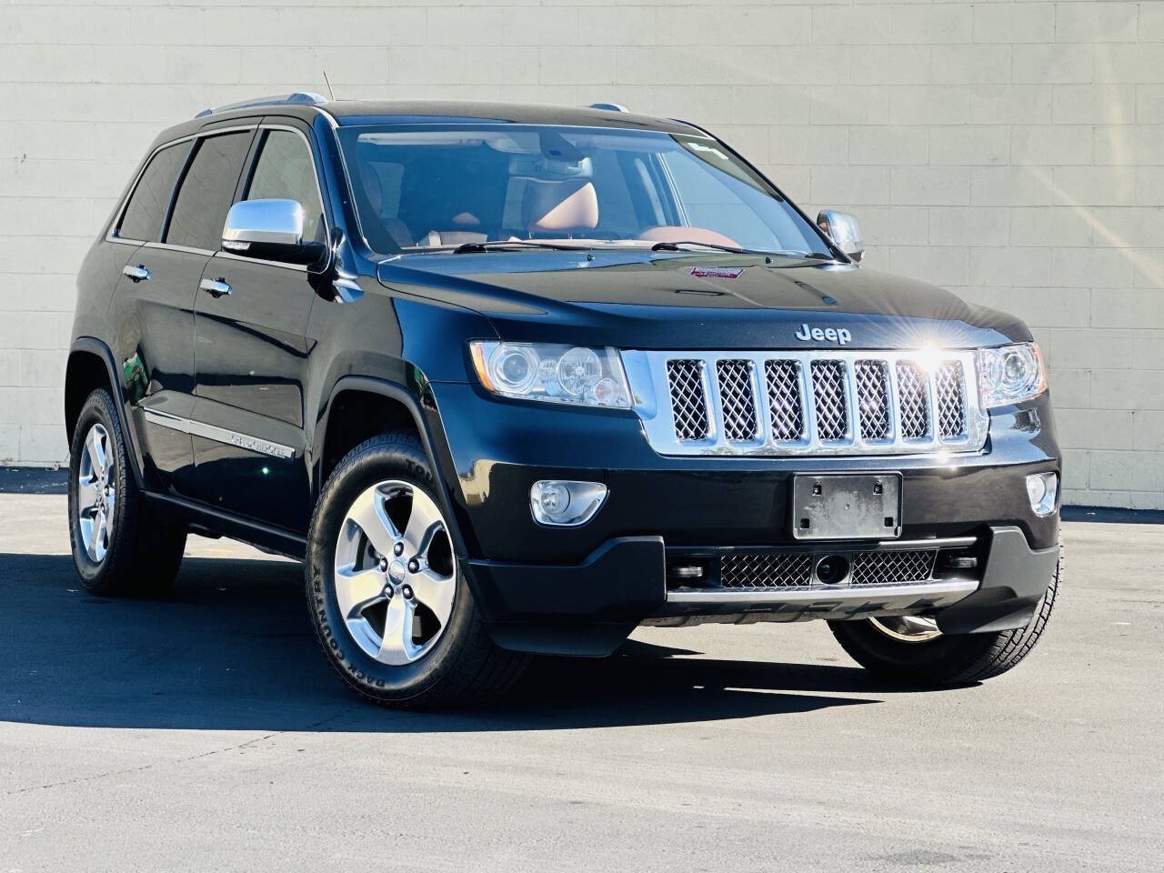 Used 2012 Jeep Grand Cherokee Overland Summit AWD/4WD image 1