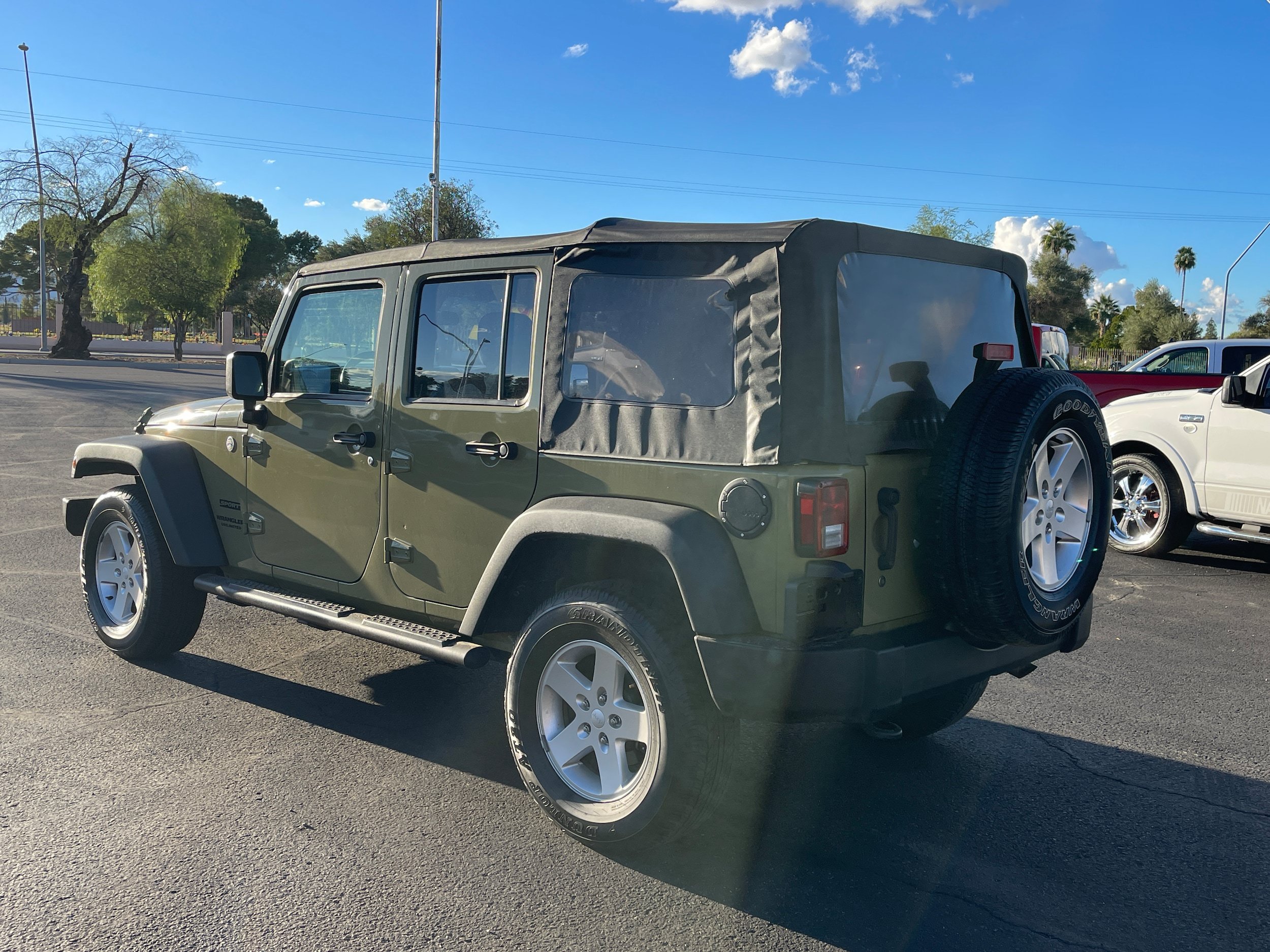Used 2013 Jeep Wrangler Unlimited Sport w/ Mopar Black Appearance Group AWD/4WD image 3
