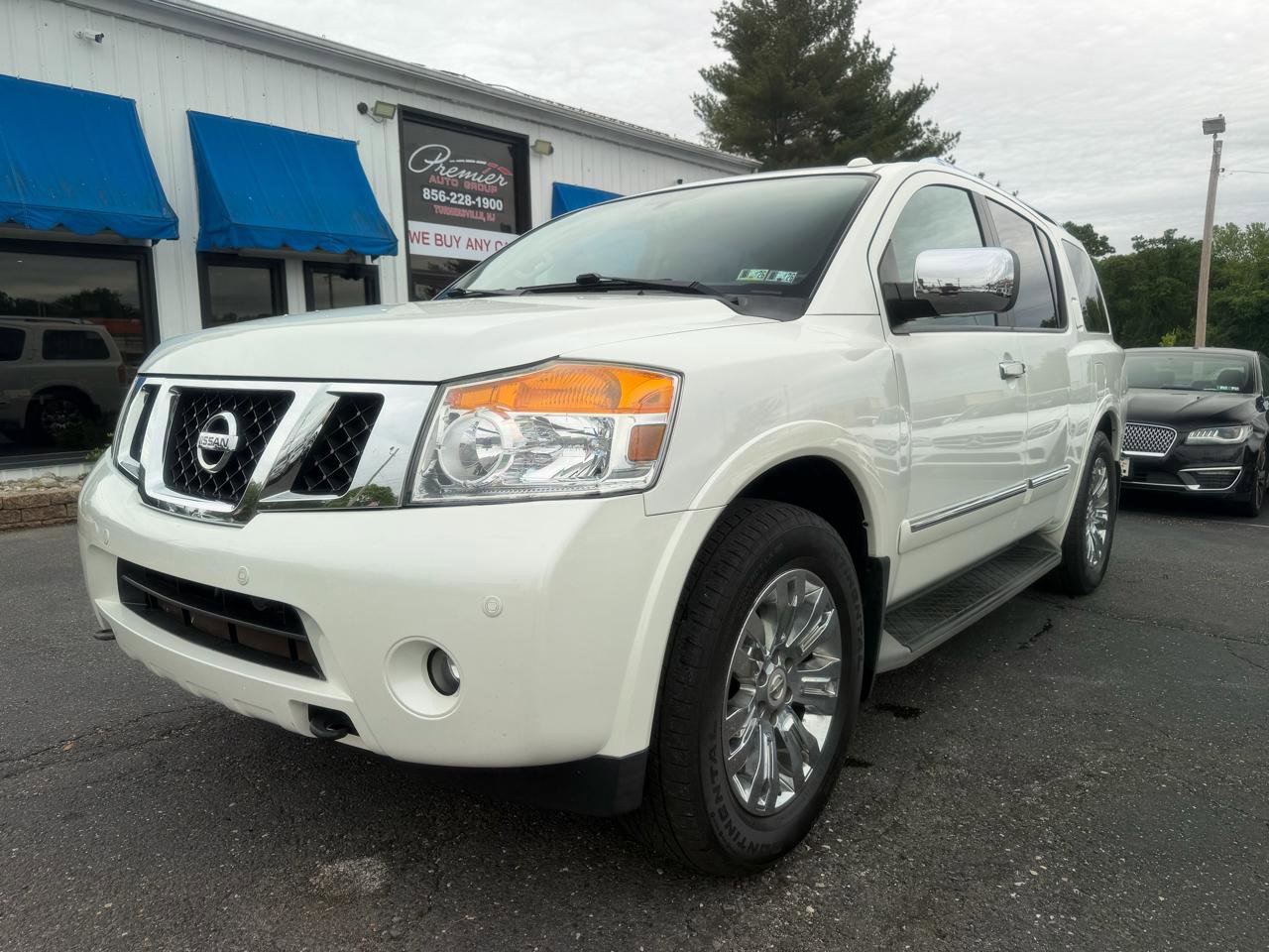 Used 2015 Nissan Armada Platinum w/ 2nd Row Captain Seat Package