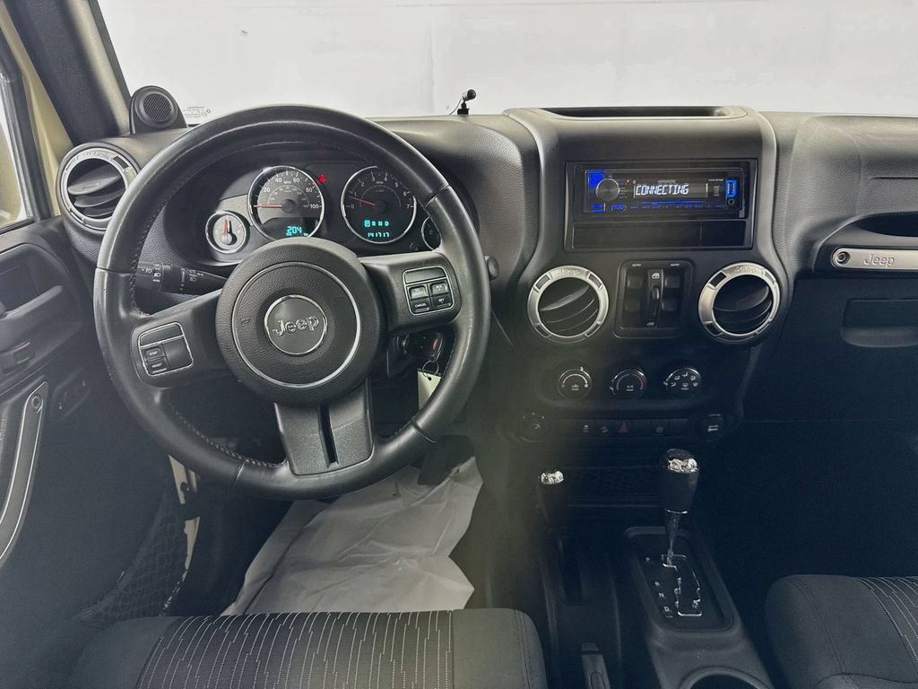 Used 2012 Jeep Wrangler Unlimited Sahara w/ Dual Top Group AWD/4WD image 24