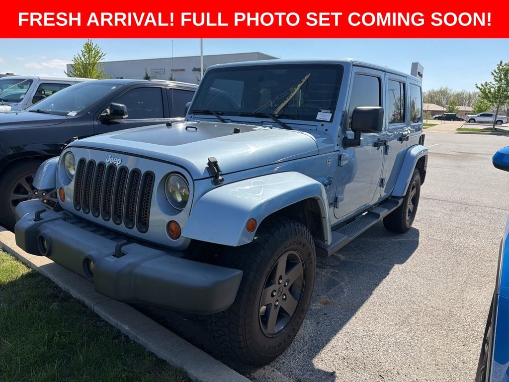 Used 2012 Jeep Wrangler Unlimited Sahara AWD/4WD image 1