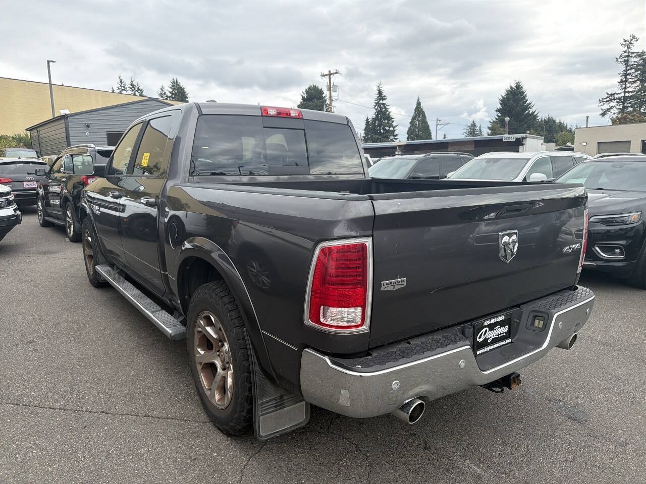 Used 2015 RAM 1500 Laramie AWD/4WD image 1